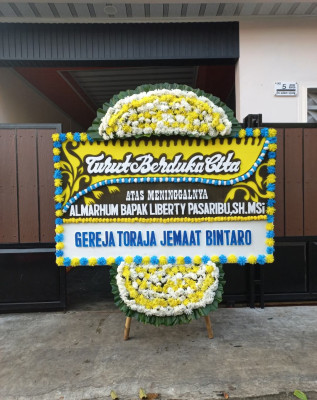 Papan Bunga Duka di Muliama
